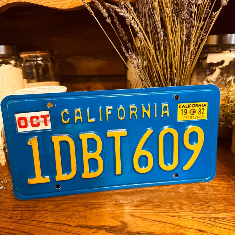 Vintage single California vehicle License Plate yellow on blue 1969-1988 style